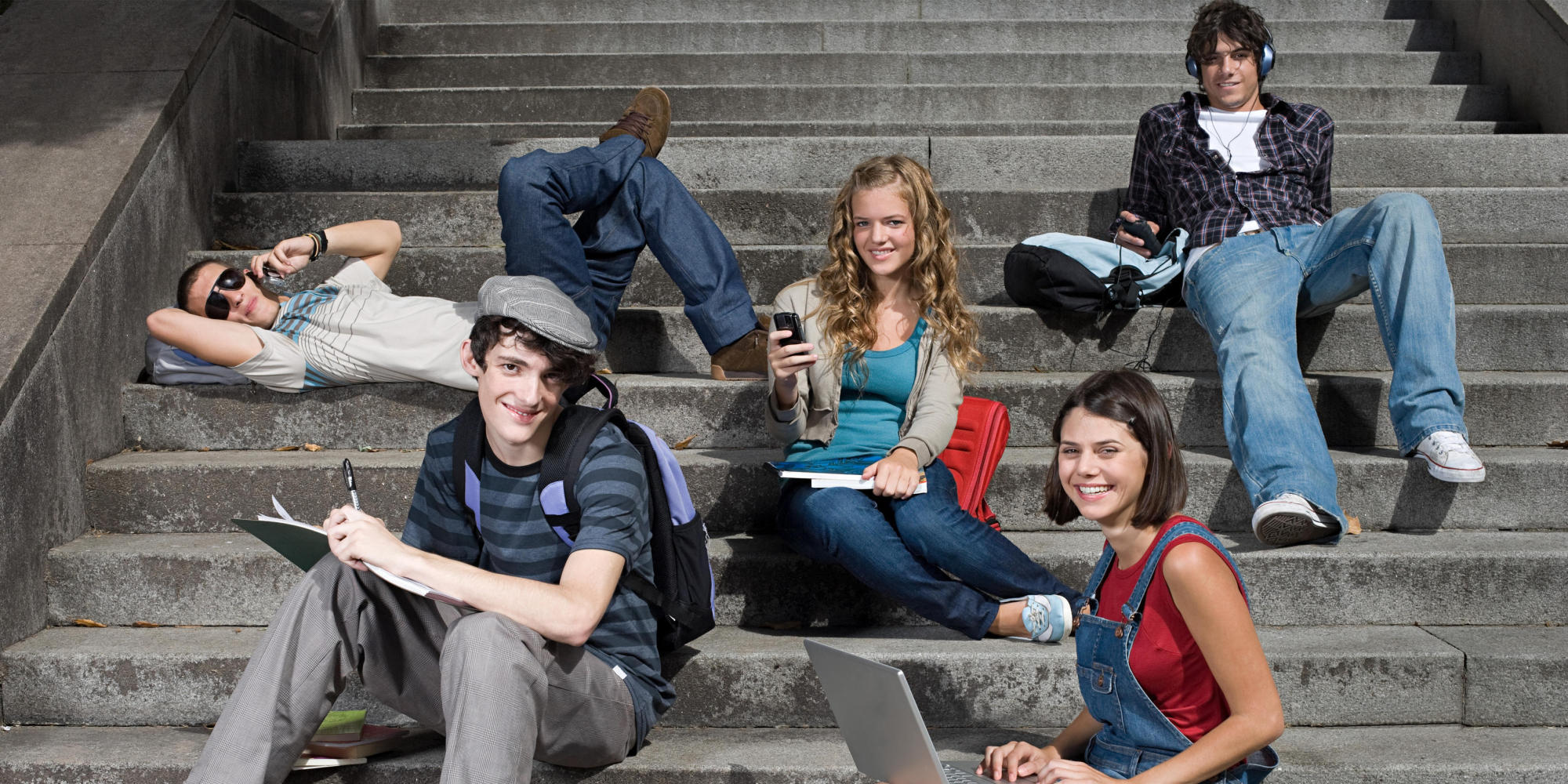 High school students sitting on steps